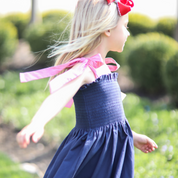 Girls Navy Smocked Dress with Gingham Tie Straps